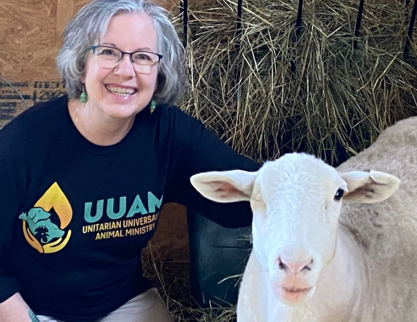 Theresa Zingery and Blue, a sheep, at Farmaste Animal Sanctuary