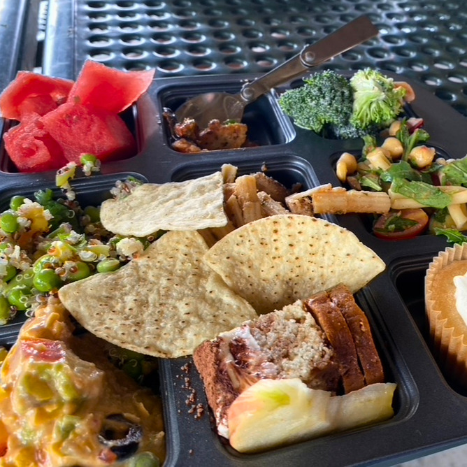 A muffin tin of food at the 2023 4th of July vegan potluck.